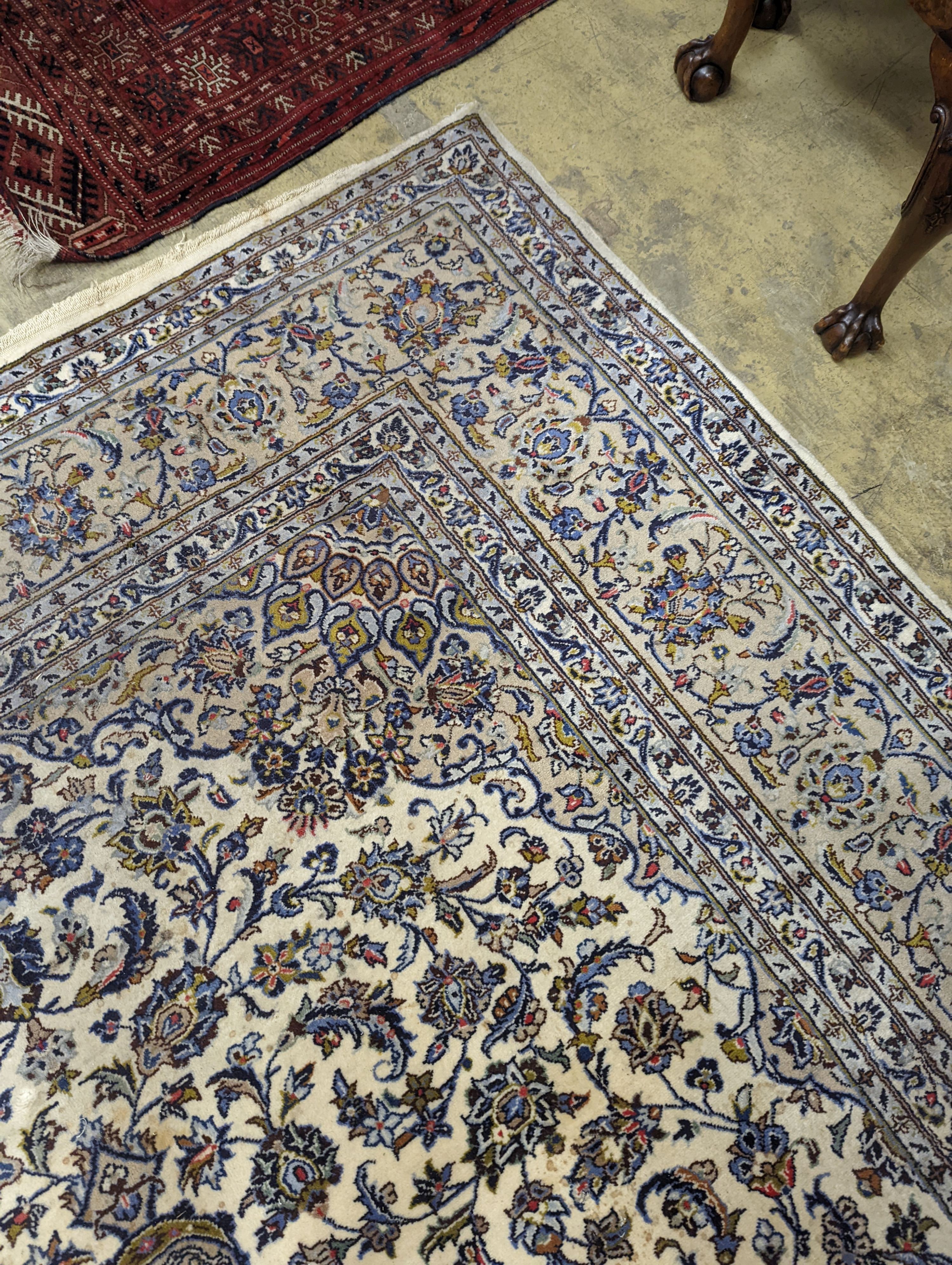A Nain ivory ground carpet, 315 x 214cm